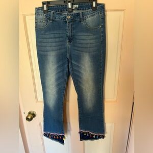 Stylish Blue Cropped Jeans with Fringe Detail